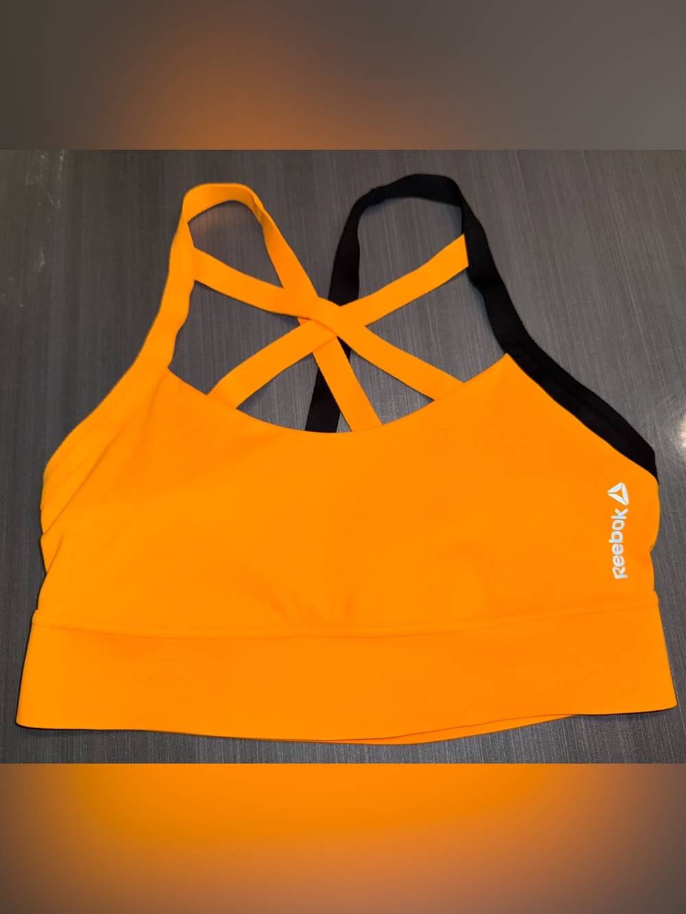 Reebok Womenโs Orange & Black Strappy Sports Bra